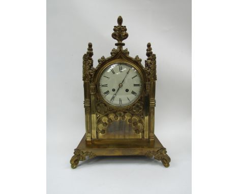 A 19th Century brass cased bracket clock of architectural design, painted metal convex Roman dial with blued steel moon hands