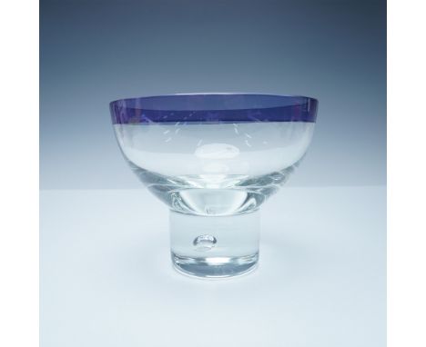 Elegant contemporary art glass bowl featuring a wide, clear body with a striking blue-colored rim. The pedestal base includes