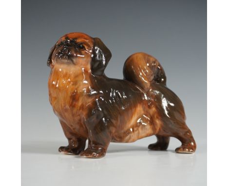 Royal Doulton figurine Pekinese featuring a beautifully detailed representation of the beloved toy breed. This hand painted c