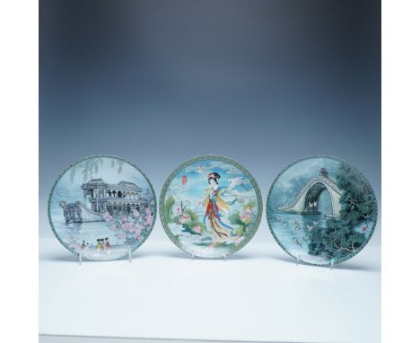 This set of Chinese Imperial Jingdezhen porcelain collector plates showcases exquisite craftsmanship and artistry from the re