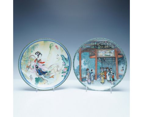 A pair of finely crafted Imperial Jingdezhen porcelain collector plates, each intricately decorated with traditional Chinese 