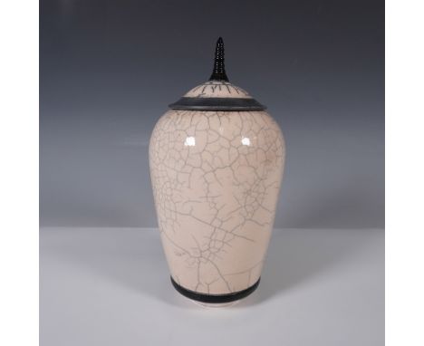 Handcrafted Raku pottery lidded jar signed by artist Andy Smith, featuring a striking crackle glaze in soft cream with contra