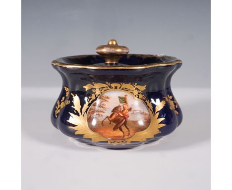 This exquisite Meissen hand-painted porcelain lidded inkwell features a cobalt blue base with gold leaf detailing and a finel