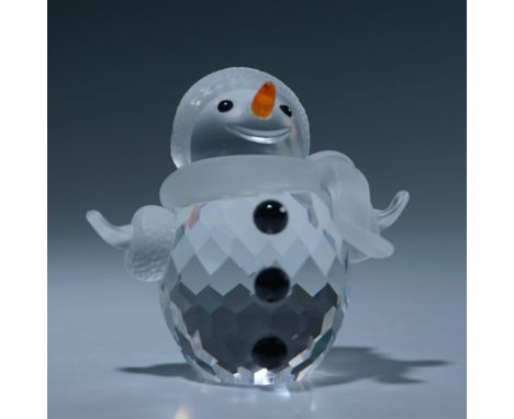 This retired Swarovski crystal snowman (#250229) was part of the Cheerful Times theme within the When We Were Young collectio