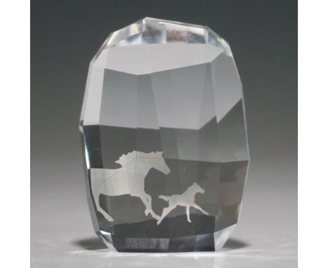 This exquisite Swarovski Crystal paperweight showcases a detailed galloping horse design, expertly etched into the crystal. T