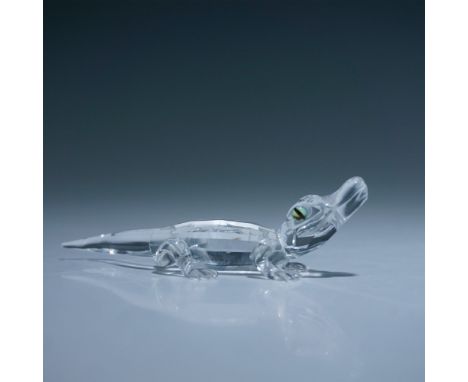 This retired Swarovski crystal Alligator is part of the Endangered Species family group. Expertly crafted in clear faceted an