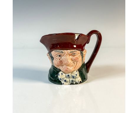 Brown hat; dark green coat; blue polka- dot bow tie. Royal Doulton backstamp.Artist: Charles J. NokeIssued: 1935 - 1983Dimens