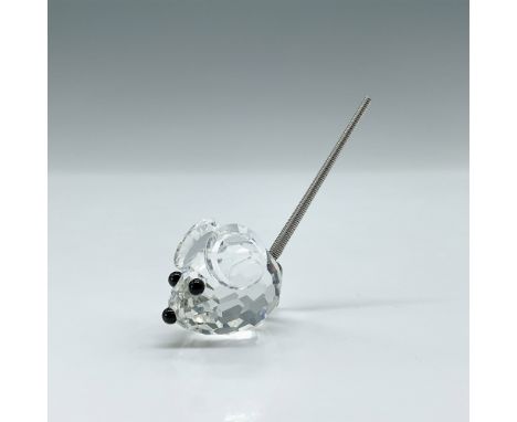 This mouse, a clear crystal figure with black crystal eyes and nose, complemented by a metal spring coil tail, was also an or