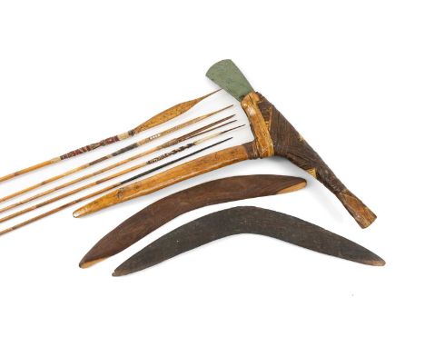 GROUP OF PACIFIC WEAPONS, including two Australian aboriginal boomerangs, one carved with animals, four Papua New Guinea bamb