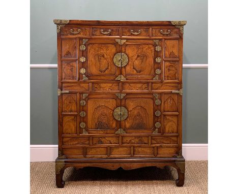 KOREAN FIGURED ELM DOUBLE CUPBOARD, 20th Century, with brass fittings, fitted four frieze drawers above two registers of pane