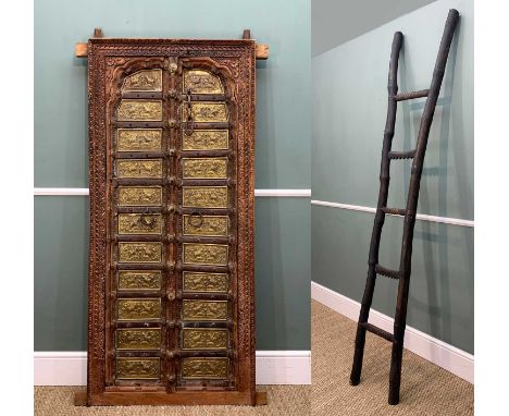 RAJASTHAN TEAK DOOR & INDONESIAN LADDER, 20th Century, the double door with horse-and-rider embossed panels, loose iron ring 