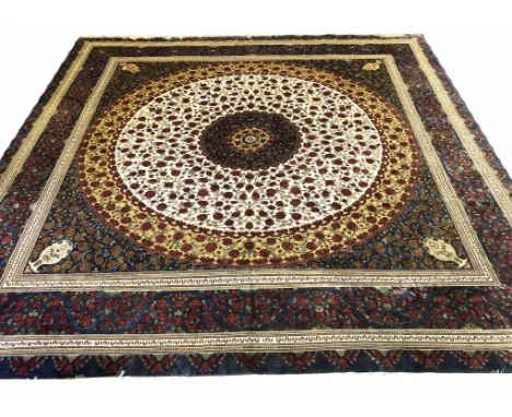 VERY FINE PURE SILK PERSIAN QUM DESIGN CARPET, 300cm x 302cm, concentric circular rose design fields within complimentary bor