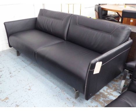 NATUZZI SOFA, two seater, in black stitched leather on chromed metal supports, 206cm.  