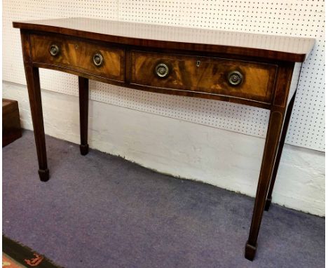 SERPENTINE SERVING TABLE, late 19th Century George III design mahogany and boxwood strung, with two long drawers above tapere