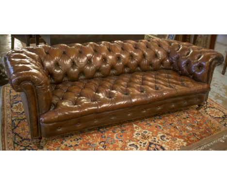 VICTORIAN CHESTERFIELD SOFA, walnut, hand finished in leaf brown deep button upholstered leather, with curved back and arms a