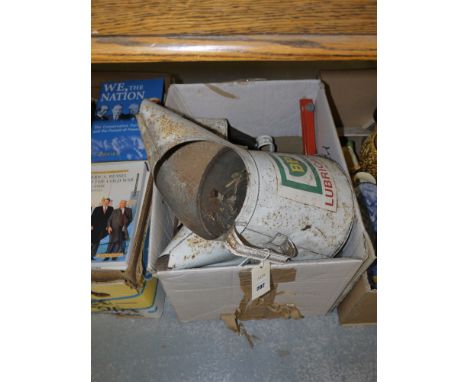 A collection of BP oil jugs; and sundries in a box.