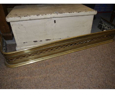 A small pierced brass curb; magazine rack; two wine tables; an alabaster table lamp; and a table top display case.