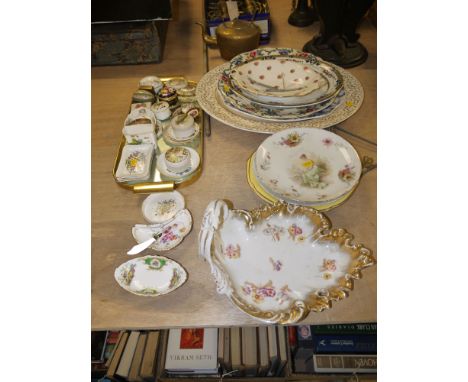 A collection of decorative ware trinket boxes and plates; together with other decorative plates.