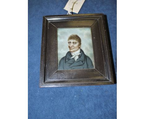 An early 20th Century portrait miniature on ivory, of a man wearing a neckerchief, inscribed "DM '17", in ebonised frame.