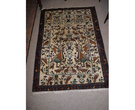 A Herati hunting rug, decorated with birds.
