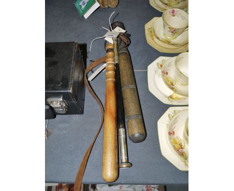 A horse whip with silver plated mounts; and two wooden truncheons. 