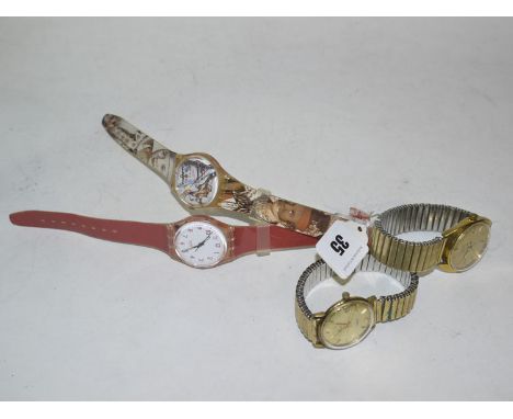 A Swatch watch with Middle Eastern decoration; a pink Swatch watch; an Avia; and a Reid wristwatch.