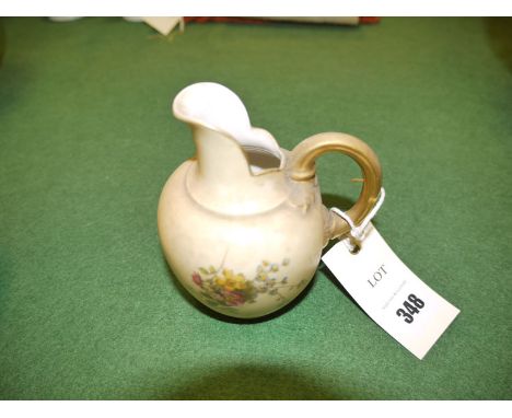 A small Royal Worcester flat back jug with floral decoration, puce mark on the base, pattern no. 1094.