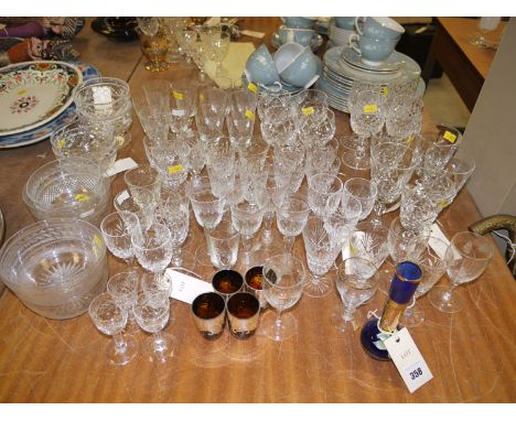 A collection of part sets of cut glasses and other drinking glasses; sundae bowls; and five pieces of coloured glass.