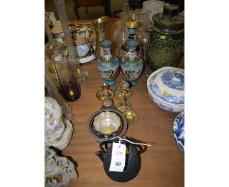 Three cloisonne vases; a bath jug; two wine coasters; a metal teapot; and brass candlesticks. 