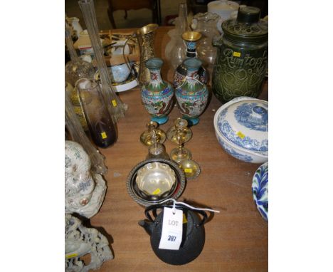 Three cloisonne vases; a bath jug; two wine coasters; a metal teapot; and brass candlesticks. 