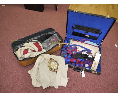 A quantity of Masonic and Templar regalia, including: a sword; robes; sashes; aprons; medallions, mainly gilt, two silver and
