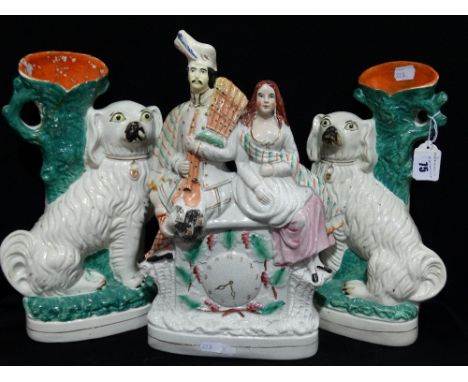 A Pair Of Staffordshire Pottery Seated Dog Spill Holder Vases Together With A Staffordshire Pottery Clock Group