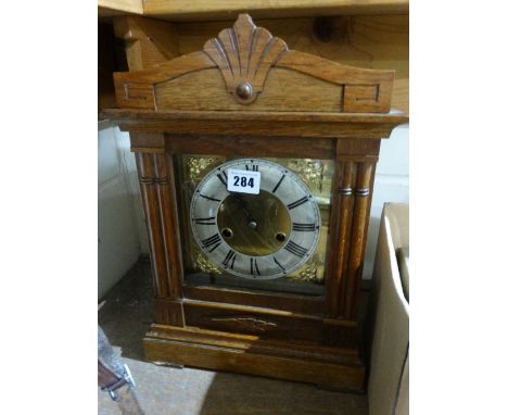 An Edwardian Oak Encased Bracket Clock With Circular Dial