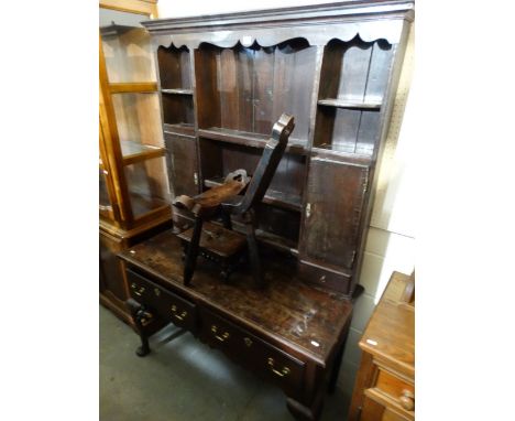 An Antique Oak Cottage Style Dresser Having A Three Shelf Rack With Side Cupboards, The Base Having Two Drawers Above An Open