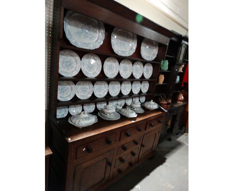 A 19th Century Oak Anglesey Dresser Having A Three Shelf Rack With A Base Of Cupboards And Drawers