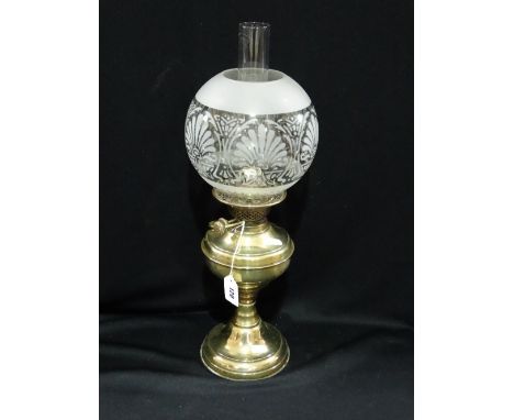 A Circular Based Victorian Brass Oil Lamp With Etched Glass Shade