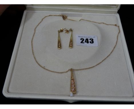 A Clogau Gold Pendant Chain And Earrings Set