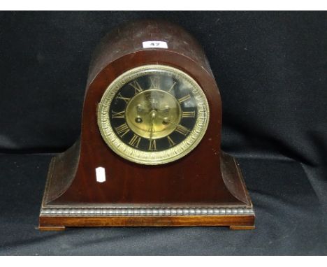 A Polished Mahogany Encased Mantel Clock With Circular Dial