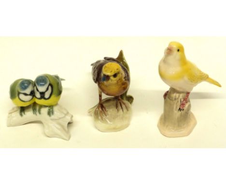 Group of three porcelain models of birds, including a Goebel model of a yellowhammer, and pair of birds on a branch (3)
