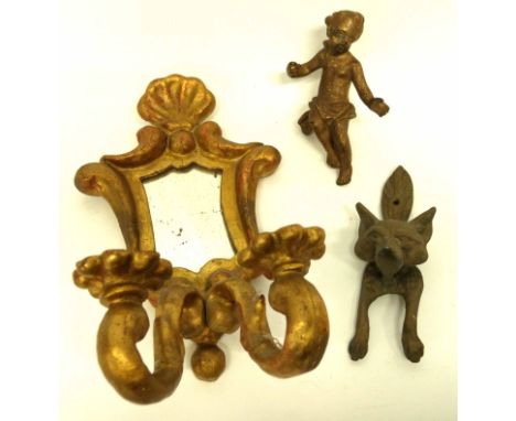 Brass door knocker, modelled as a fox's head, together with a small gilt mirror and candelabra, and a bronzed metal cherub (3