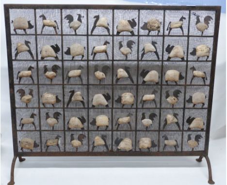In the style of Atelier Marolles c1950 Wrought iron fireguard decorated with panels of farmyard animals, approx 90cm wide hei