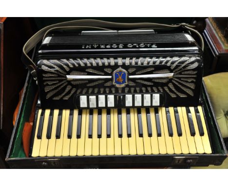 A large cased Accordion, maker Paolo Soprani, finished in black.