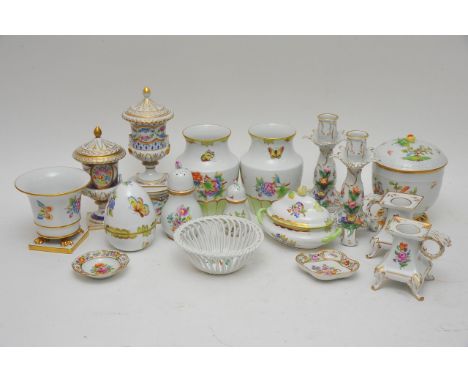 A collection of Herend and Dresden porcelain including a pair of vases, egg shaped trinket box and candlesticks