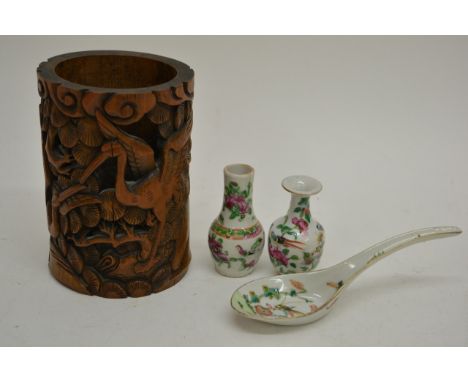 A Chinese carved bamboo brush pot, damaged, two miniature famille vert vases and a ladle painted with insects