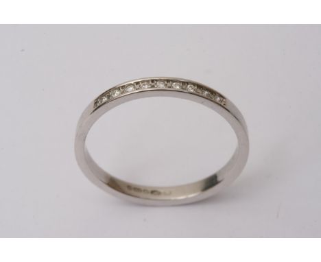 An 18ct gold half hoop eternity ring set with diamonds size K weight 2g approx