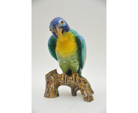 A George Jones majolica style ceramic parrot, approx height 29.5cm (some damage).