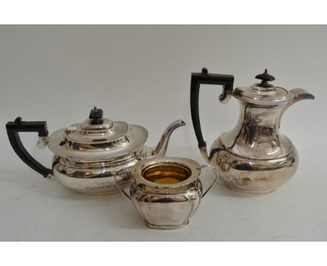 A matching silver plated coffee and teapot and a Romney sucrier