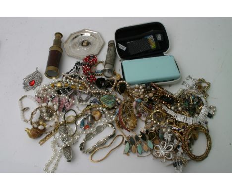 A bag of various costume jewellery with game console