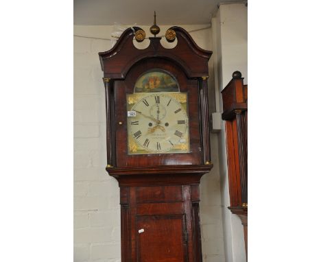 An eight day longcase clock by John Dumrill of Cambridge, with scrollwork pediment above an arch painted dial, approx height 