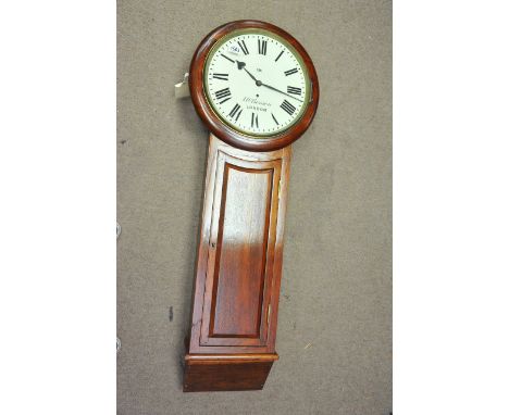 A 1911 J.W. Benson weight driven longcase clock in a teak case with pendulum, approx height 128cm.